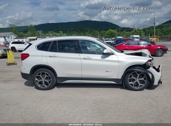 WBXHT3C35H5F73398 2017 BMW X1 White Rear interior view