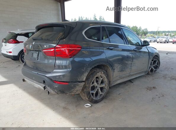WBXHT3C35J5F89879 2018 BMW X1 Gray Trasero derecho
