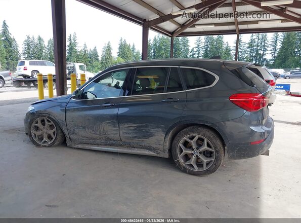 WBXHT3C35J5F89879 2018 BMW X1 Gray Vista interior de 360 grados
