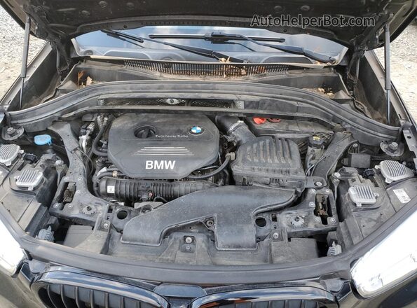 WBXHT3C36G5E50725 2016 BMW X1 Black Вид підкапотного простору