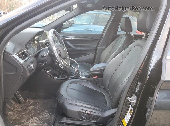 WBXHT3C36G5E50725 2016 BMW X1 Black Вид салону спереду