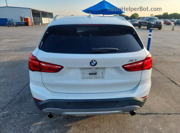 WBXHT3C36H5F70106 2017 BMW X1 White Հետևի տեսք