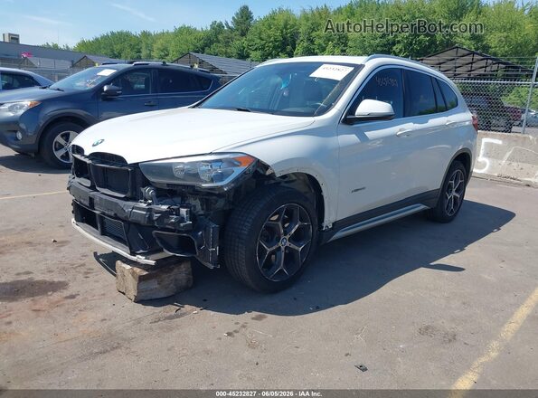 WBXHT3C36H5F77704 2017 BMW X1 White წინა მარცხენა ხედი სამი მეოთხედიდან