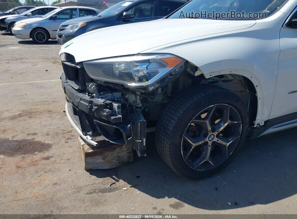 WBXHT3C36H5F77704 2017 BMW X1 White წინა ხედი