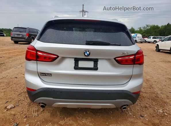 WBXHT3C36J5F90135 2018 BMW X1 Silver Հետևի տեսք