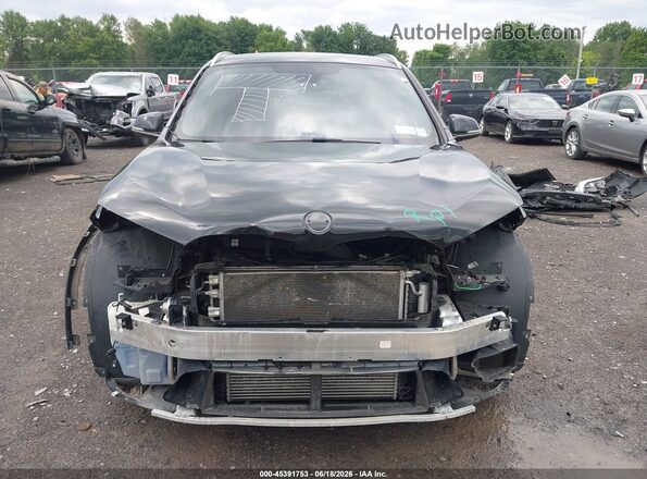WBXHT3C36J5K25869 2018 BMW X1 Black Вид задньої частини салону