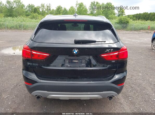 WBXHT3C36J5K25869 2018 BMW X1 Black 