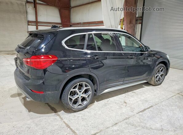 WBXHT3C36J5L29584 2018 BMW X1 Black 