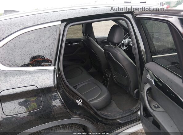 WBXHT3C37G5E49096 2016 BMW X1 Black VIN კოდის სტიკერის ხედი