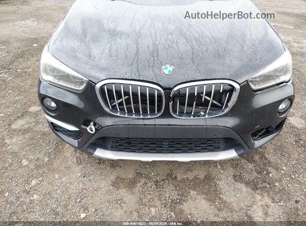 WBXHT3C37G5E49096 2016 BMW X1 Black წინა ხედი