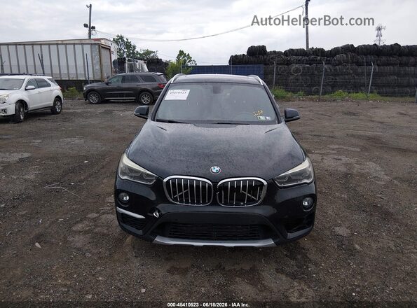 WBXHT3C37G5E49096 2016 BMW X1 Black ხელსაწყოთა პანელის ხედი