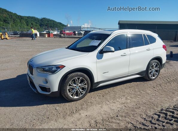 WBXHT3C37G5E50748 2016 BMW X1 White 