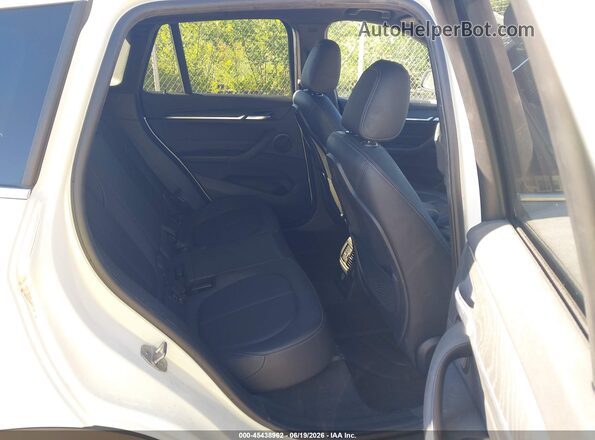 WBXHT3C37G5E50748 2016 BMW X1 White 