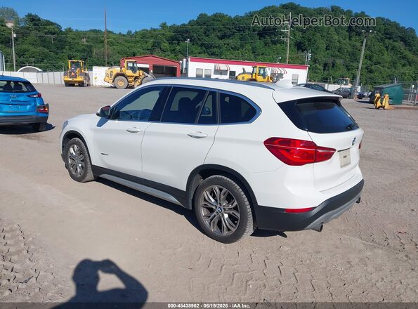 WBXHT3C37G5E50748 2016 BMW X1 White 