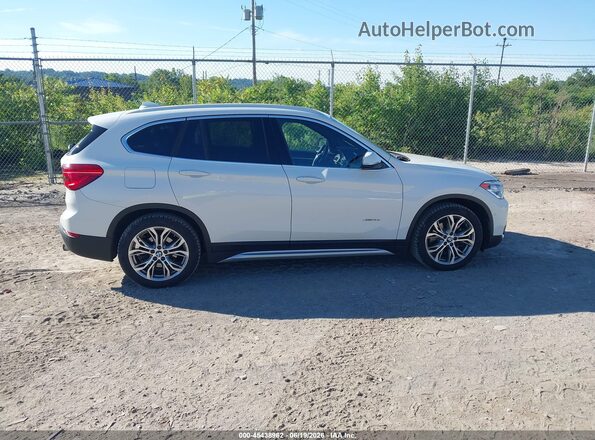 WBXHT3C37G5E50748 2016 BMW X1 White 