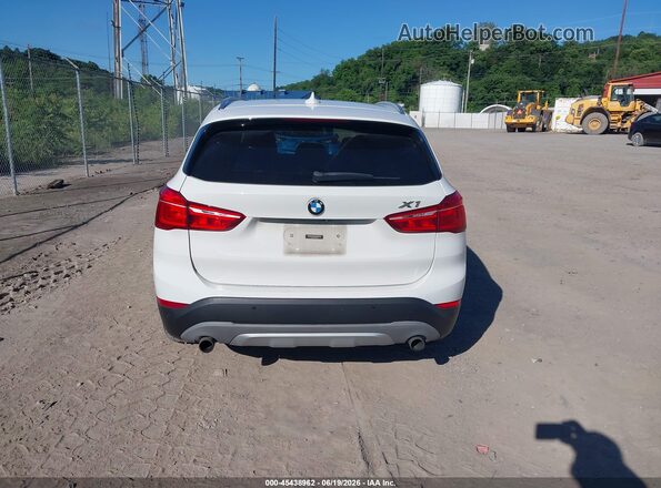 WBXHT3C37G5E50748 2016 BMW X1 White 