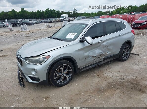 WBXHT3C37GP881883 2016 BMW X1 Silver Առջևի ձախ երեք քառորդ տեսարան