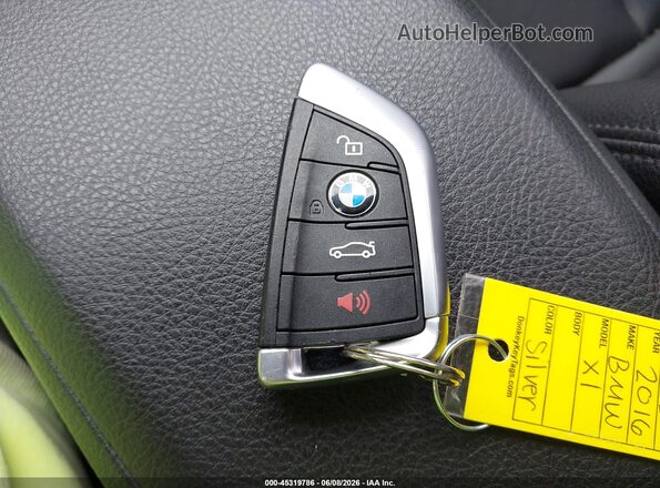 WBXHT3C37GP881883 2016 BMW X1 Silver Առջևի վահանակի տեսք