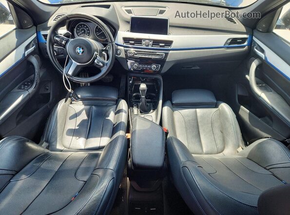 WBXHT3C37H5F80031 2017 BMW X1 Blue Dashboard view