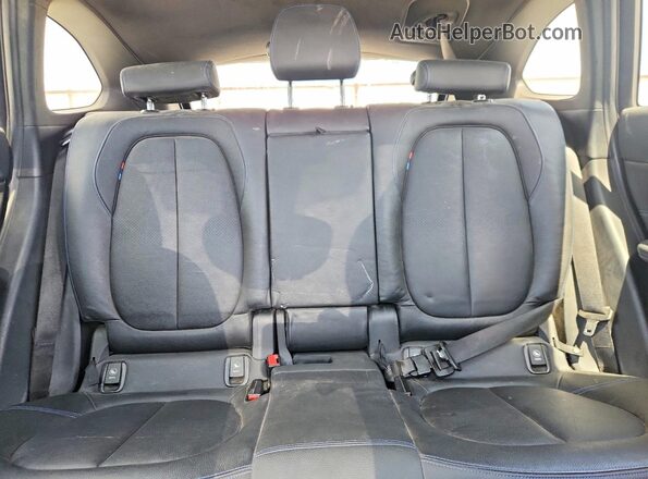 WBXHT3C37H5F80031 2017 BMW X1 Blue Rear seats view