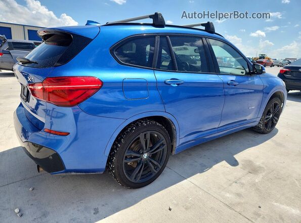 WBXHT3C37H5F80031 2017 BMW X1 Blue Rear right
