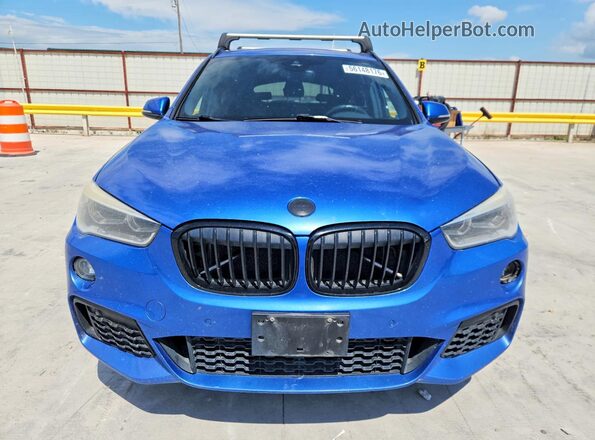 WBXHT3C37H5F80031 2017 BMW X1 Blue Front view
