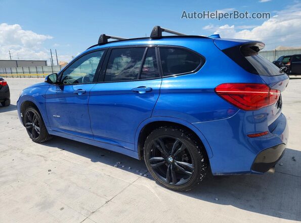 WBXHT3C37H5F80031 2017 BMW X1 Blue Rear left