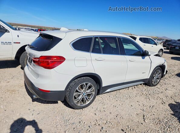 WBXHT3C37H5F82412 2017 BMW X1 White Rear right