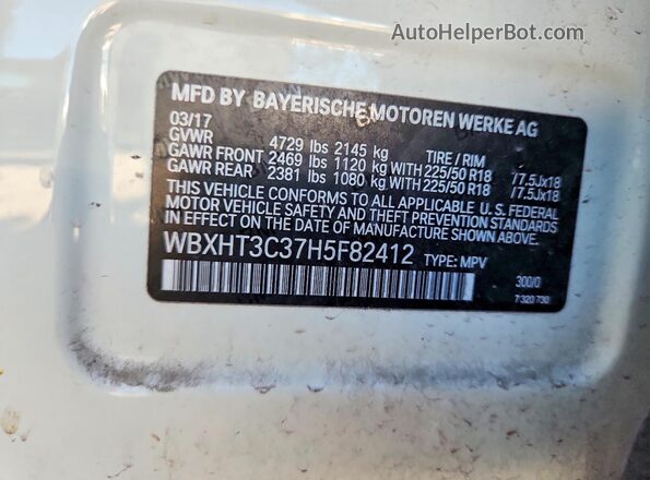 WBXHT3C37H5F82412 2017 BMW X1 White Engine compartment view