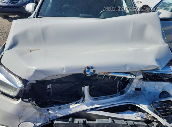 WBXHT3C37H5F82412 2017 BMW X1 White Rear interior view
