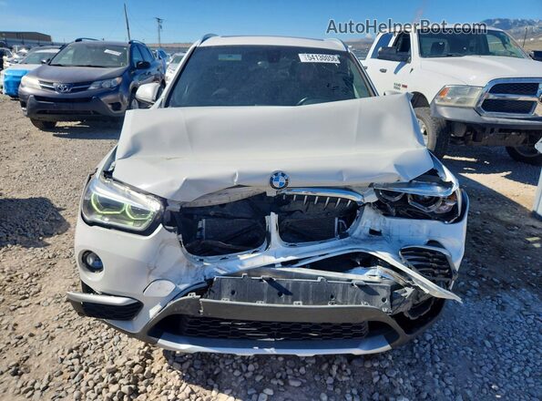 WBXHT3C37H5F82412 2017 BMW X1 White Front view