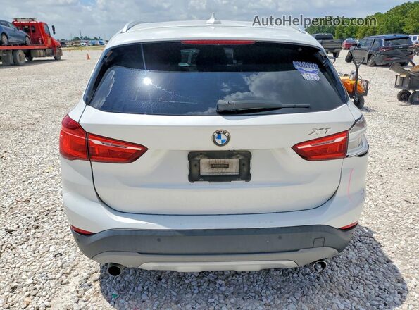 WBXHT3C38H5F87991 2017 BMW X1 Белый Вид сзади