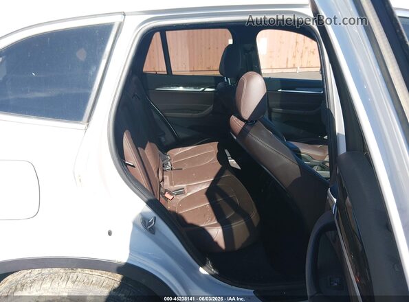 WBXHT3C38J5F90086 2018 BMW X1 White Vista de la etiqueta del VIN