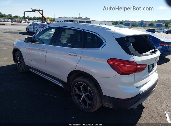 WBXHT3C38J5F90086 2018 BMW X1 White Trasero izquierdo