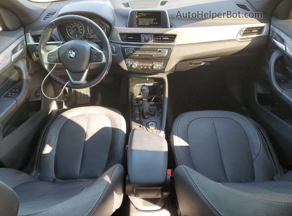 WBXHT3C39G5E51433 2016 BMW X1 Black Առջևի վահանակի տեսք