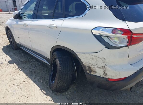 WBXHT3C39G5E52551 2016 BMW X1 Белый Вид спереди