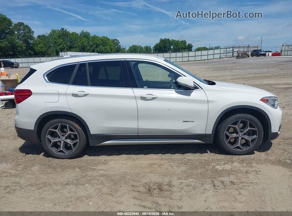 WBXHT3C39G5E52551 2016 BMW X1 Белый Вид задней части салона