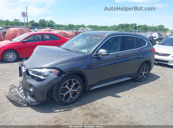 WBXHT3C39G5E52761 2016 BMW X1 Gray Առջևի ձախ երեք քառորդ տեսարան