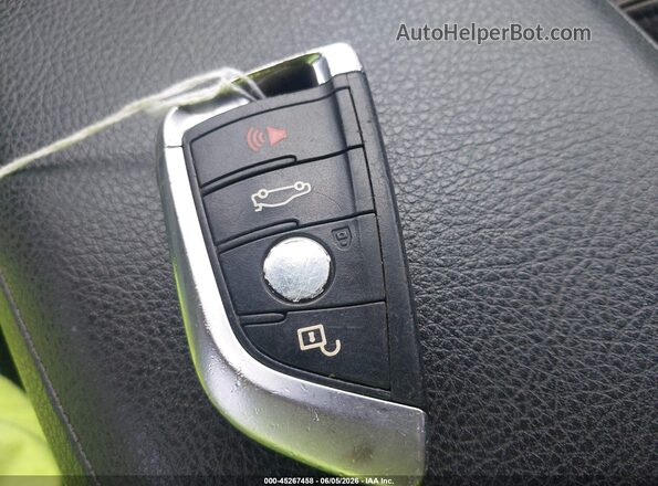 WBXHT3C39G5E52761 2016 BMW X1 Gray Առջևի վահանակի տեսք