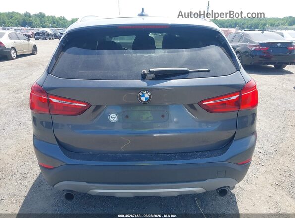 WBXHT3C39G5E52761 2016 BMW X1 Gray 
