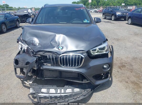WBXHT3C39G5E52761 2016 BMW X1 Gray Սարքավորումների վահանակի տեսք