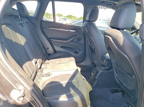 WBXHT3C39G5E54414 2016 BMW X1 Charcoal Հետևի նստատեղերի տեսք