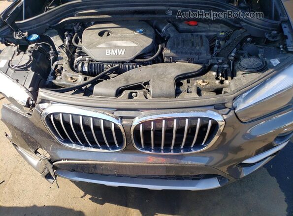 WBXHT3C39G5E54414 2016 BMW X1 Charcoal Սալոնի հետևի տեսք