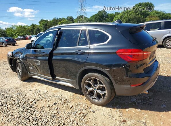 WBXHT3C39H5F67894 2017 BMW X1 Black Rear left