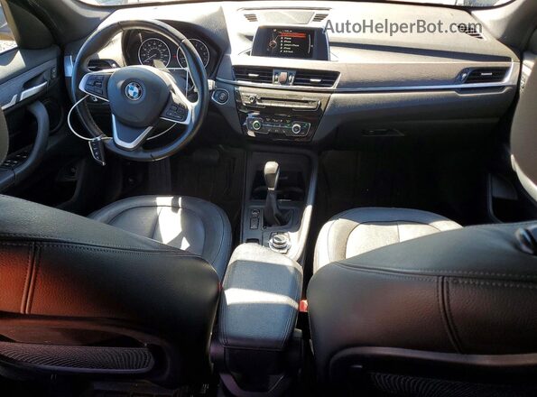 WBXHT3C39H5F67894 2017 BMW X1 Black Dashboard view