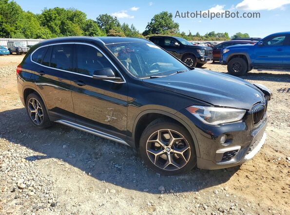WBXHT3C39H5F67894 2017 BMW X1 Black Front right