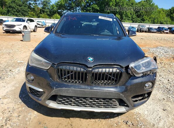 WBXHT3C39H5F67894 2017 BMW X1 Black Front view