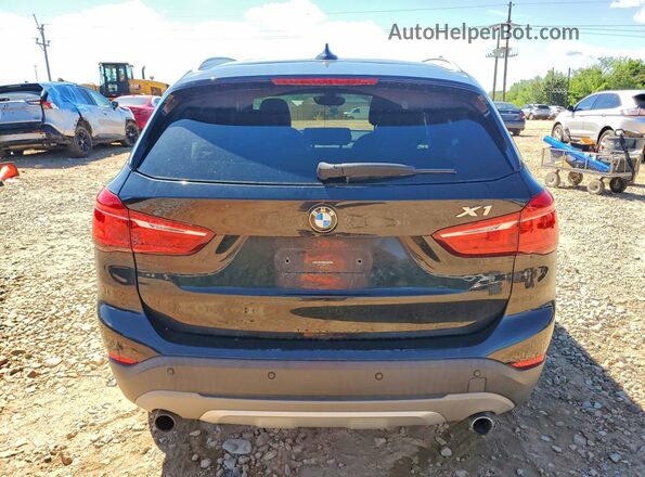 WBXHT3C39H5F67894 2017 BMW X1 Black Rear view