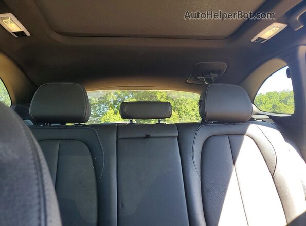 WBXHT3C39H5F67894 2017 BMW X1 Black Rear seats view