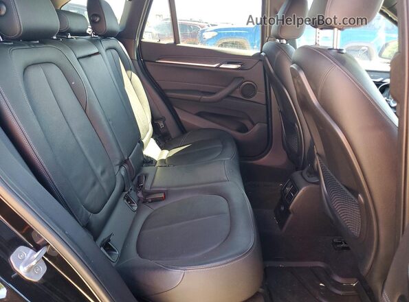 WBXHT3C39H5F67894 2017 BMW X1 Black Rear interior view